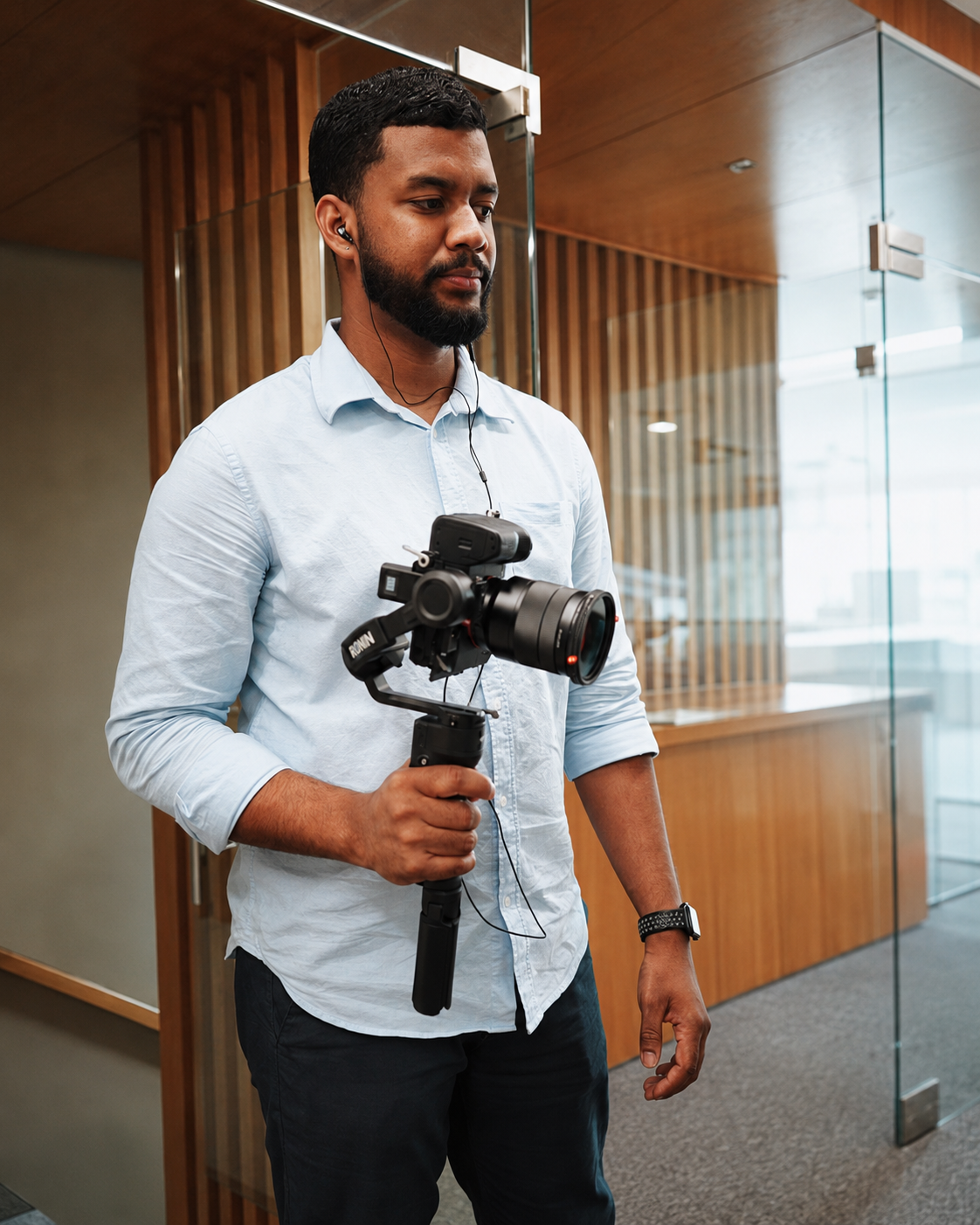 Matheus filming with a camera gimbal